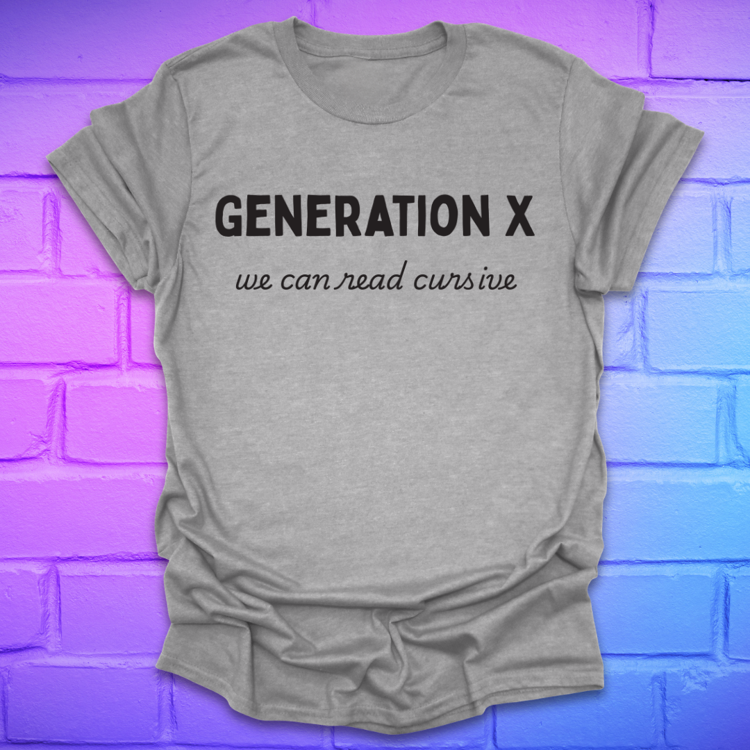 Gray t-shirt with 'Generation X, we can read cursive' text on a brick wall background