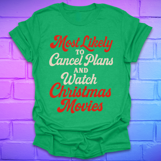 Green t-shirt with Christmas-themed text on a purple brick wall background