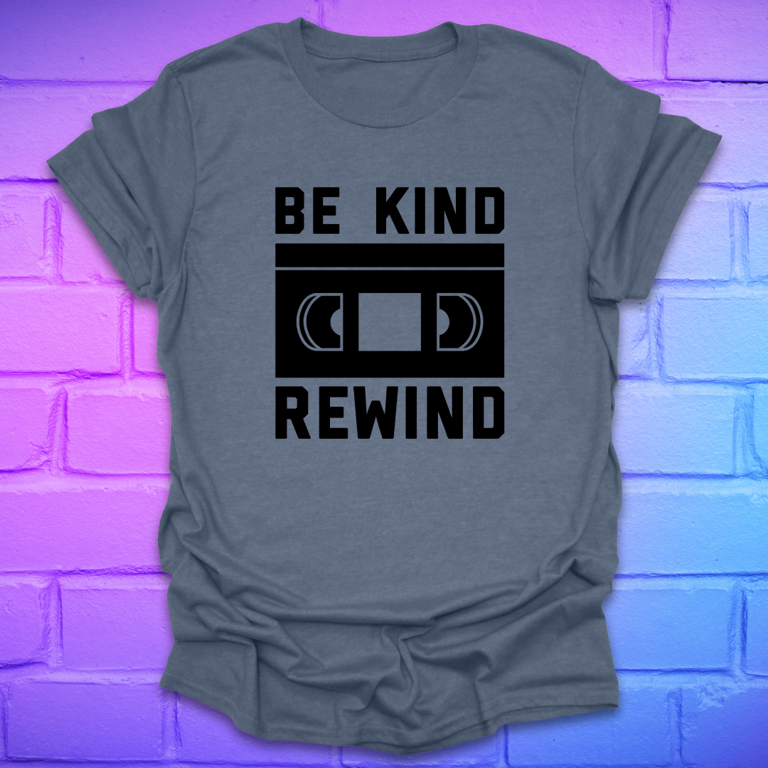 Heather indigo t-shirt with 'Be Kind Rewind' graphic on a brick wall background
