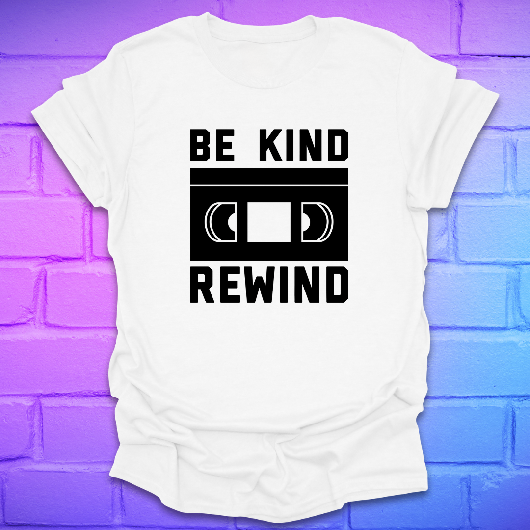 White t-shirt with 'Be Kind Rewind' design on a colorful brick wall background