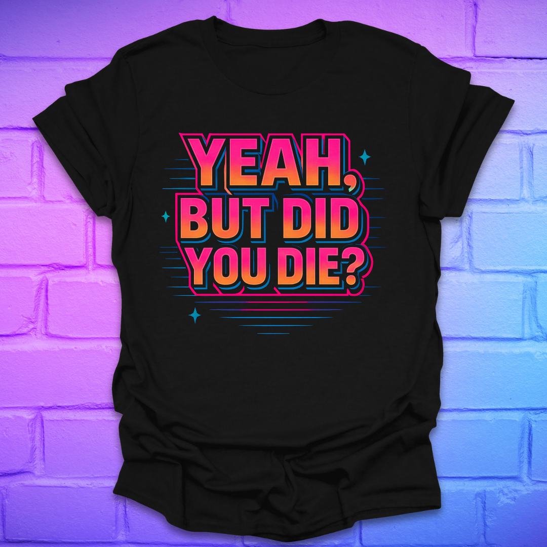 Black t-shirt with colorful text 'Yeah, but did you die?' on a brick wall background