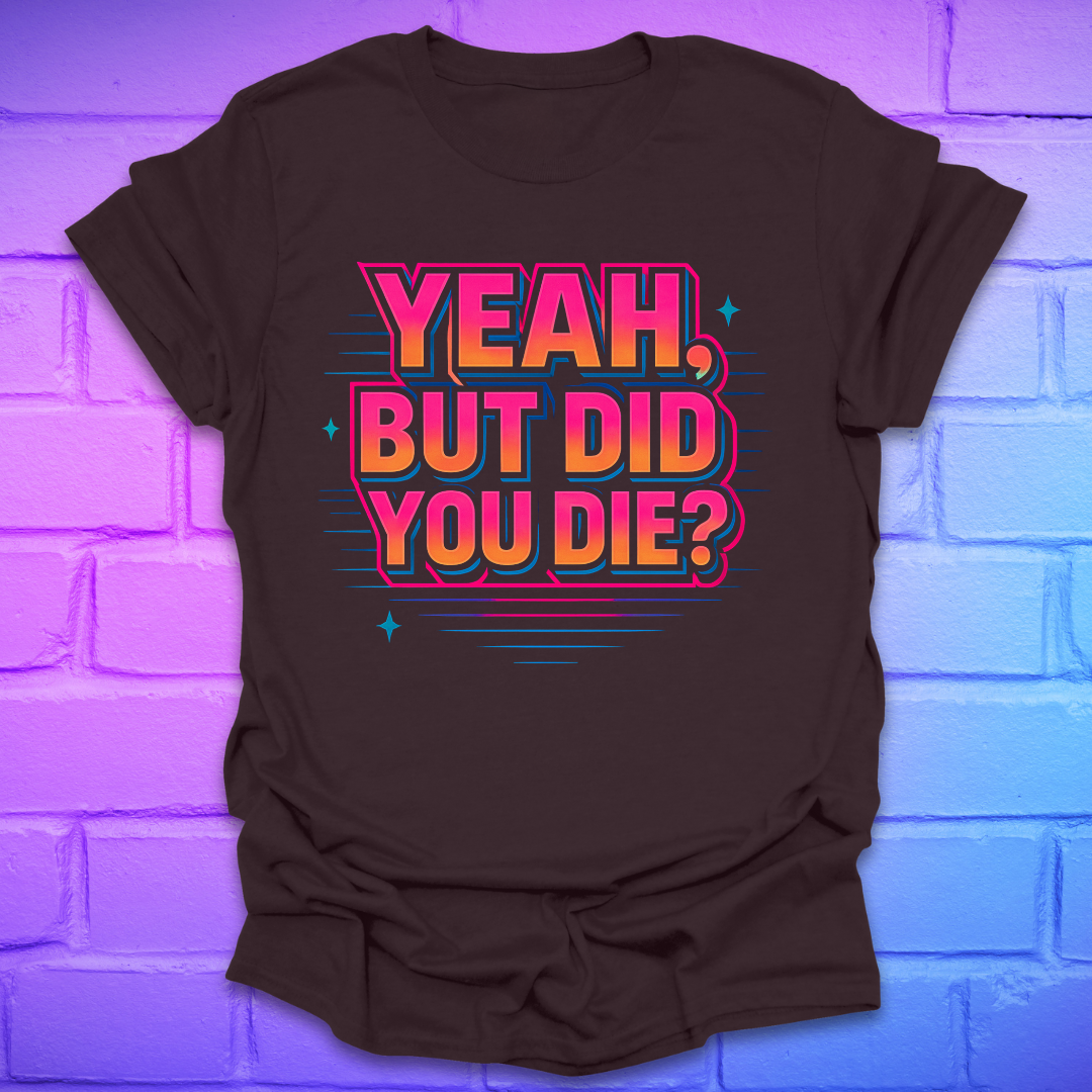 Brown t-shirt with colorful text 'Yeah, but did you die?' on a brick wall background