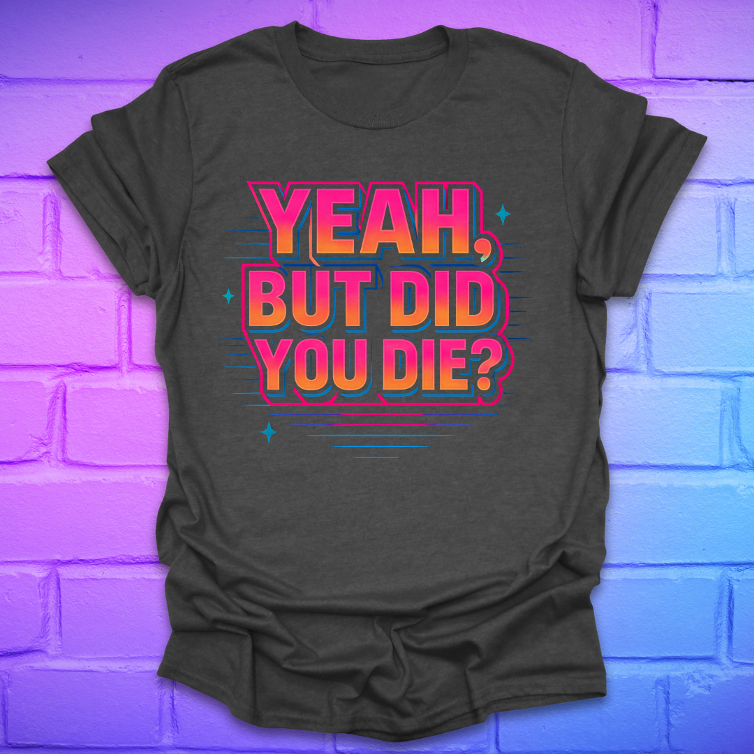 Gray t-shirt with colorful text 'Yeah, but did you die?' on a brick wall background