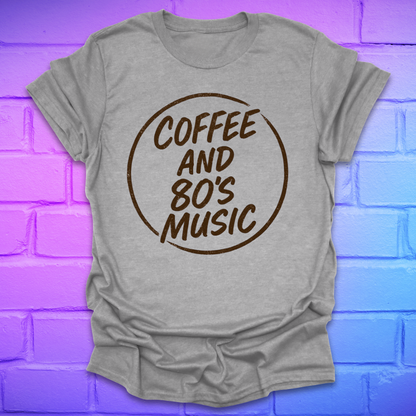 Gray t-shirt with 'Coffee and 80's Music' text on a brick wall background
