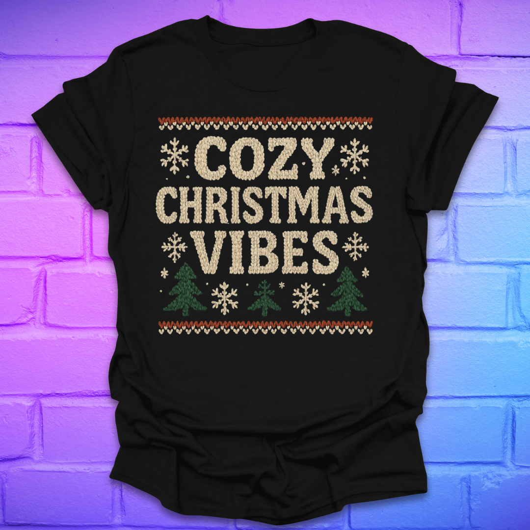 Black t-shirt with 'Cozy Christmas Vibes' text on a brick wall background
