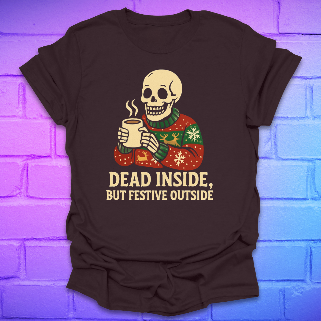 Brown t-shirt with a skeleton holding a mug and text 'Dead Inside, But Festive Outside' on a brick wall background.