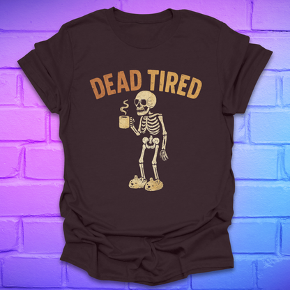 Brown t-shirt with skeleton graphic and 'DEAD TIRED' text on a brick wall background