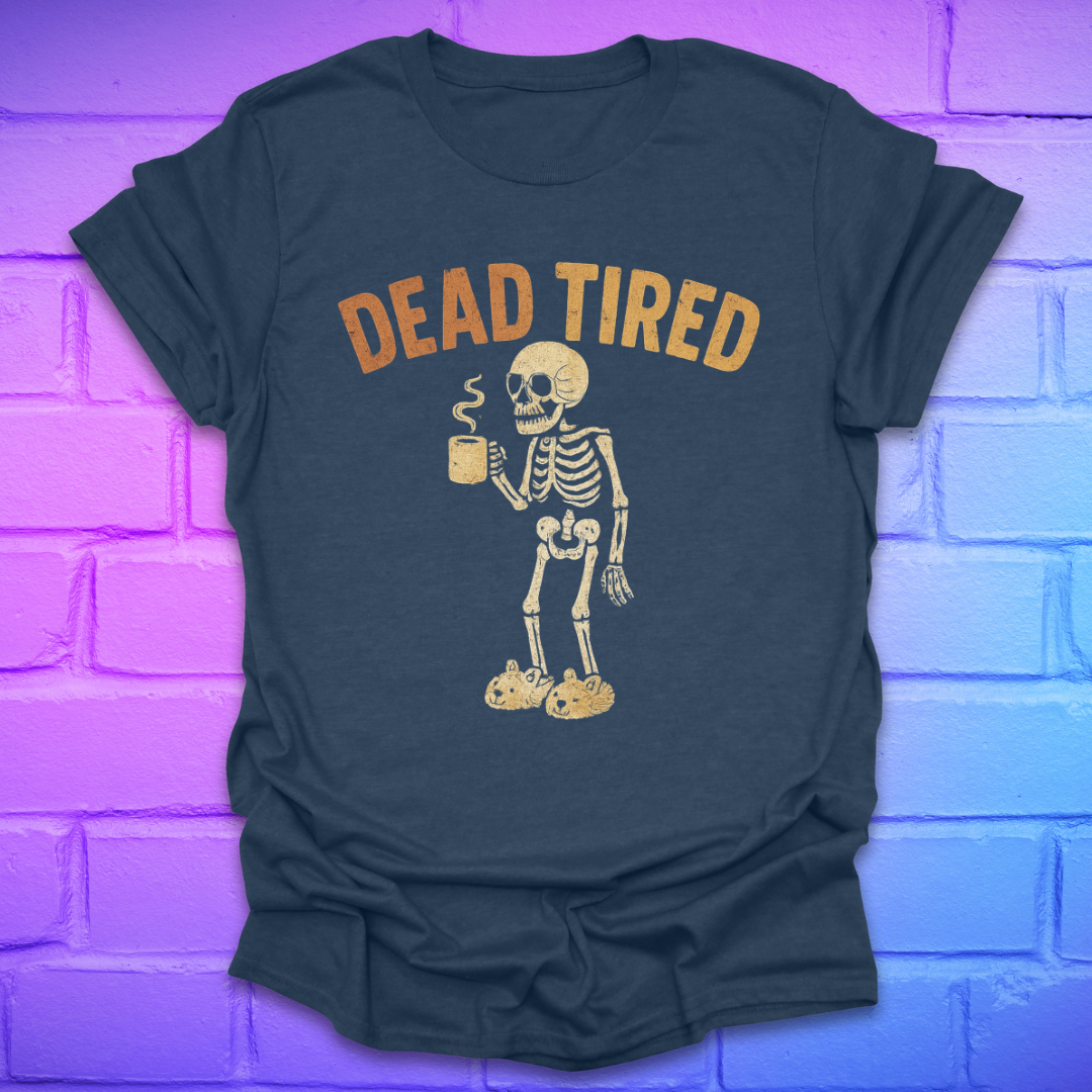 navy T-shirt with skeleton holding a coffee cup and 'DEAD TIRED' text on a brick wall background