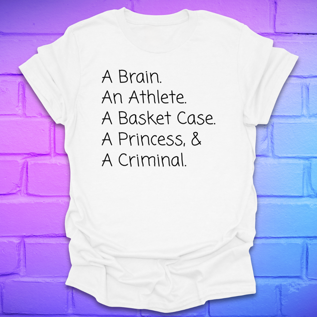 White t-shirt with black text on a purple brick wall background