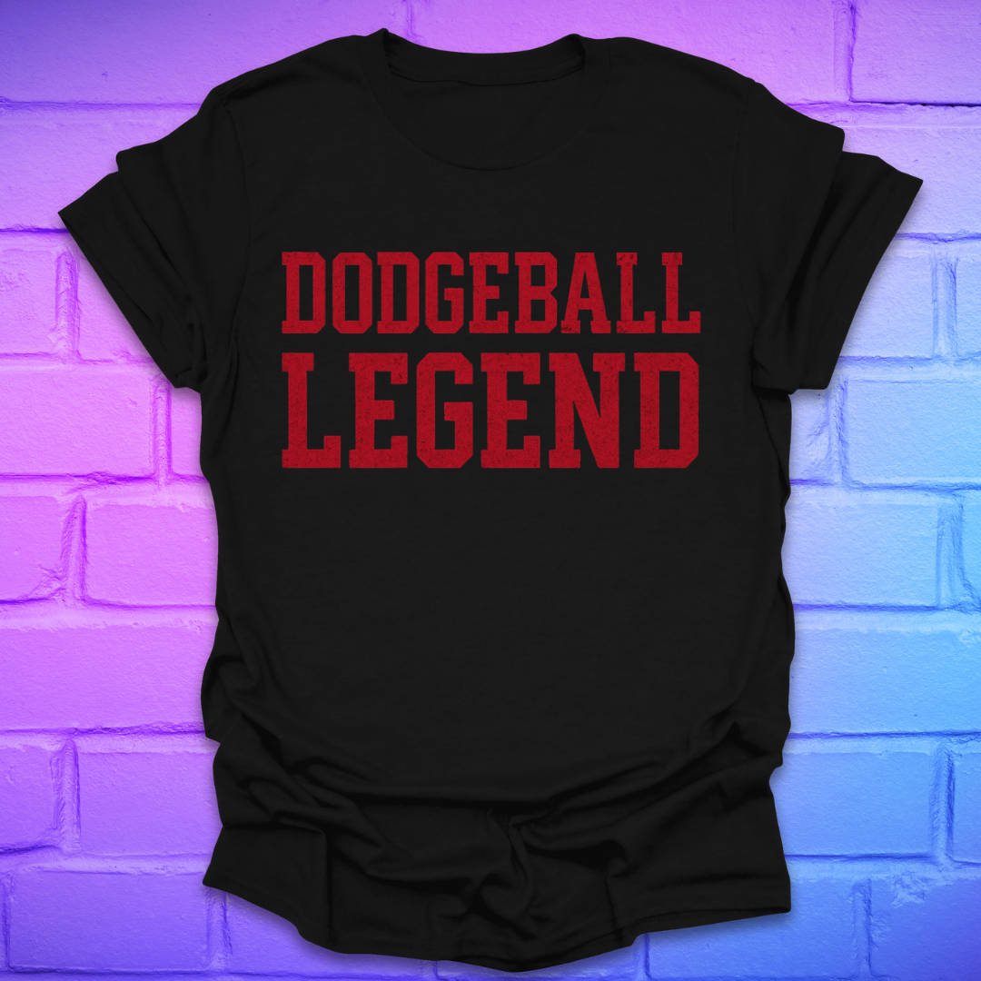 Black t-shirt with 'Dodgeball Legend' in red text against a colorful brick wall background