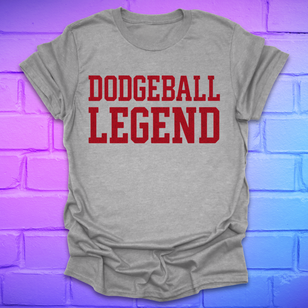 Gray t-shirt with 'Dodgeball Legend' in red text on a brick wall background