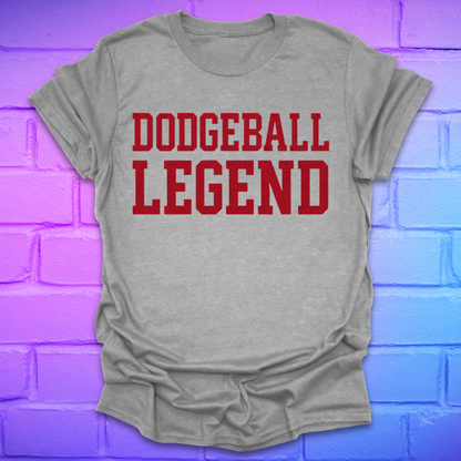 Gray t-shirt with 'Dodgeball Legend' in red text on a brick wall background