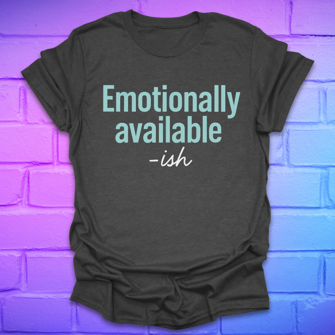 Dark gray t-shirt with 'Emotionally available -ish' text on a brick wall background