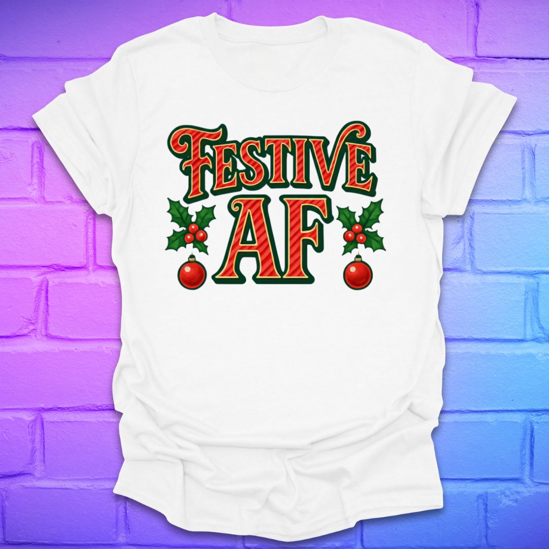 White t-shirt with 'Festive AF' text on a colorful brick wall background