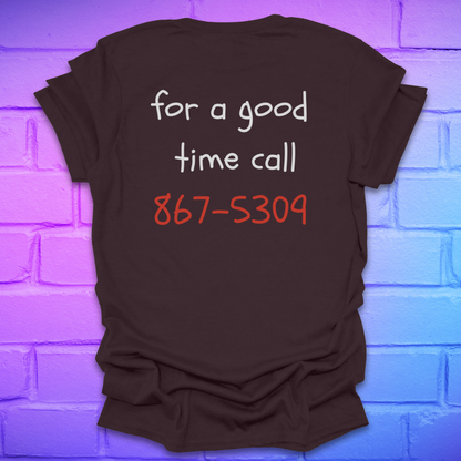 Brown t-shirt with text 'for a good time call 867-5309' on a brick wall background