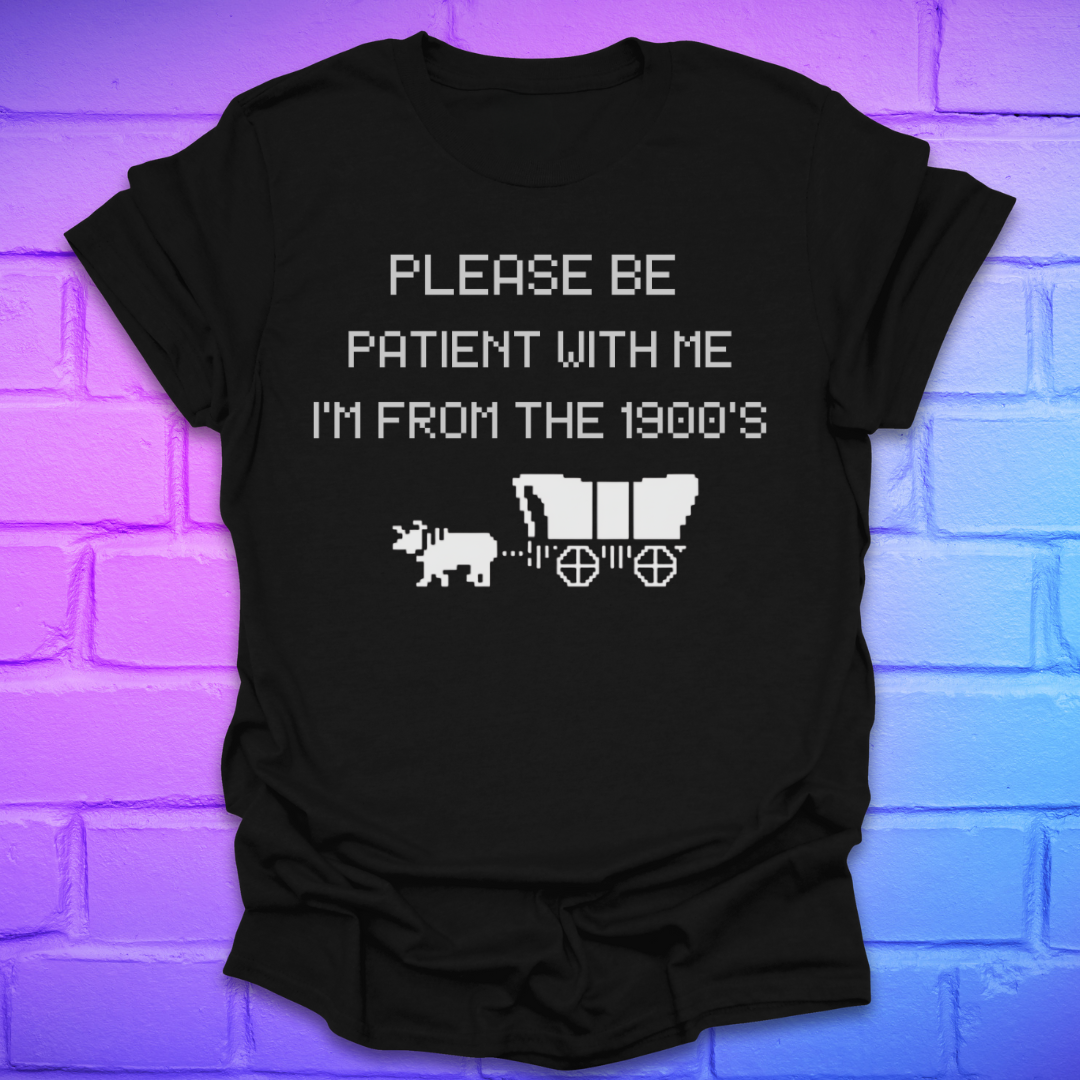 Black t-shirt with white text, 'please be patient with me im from the 1900s' and graphics on a brick wall background