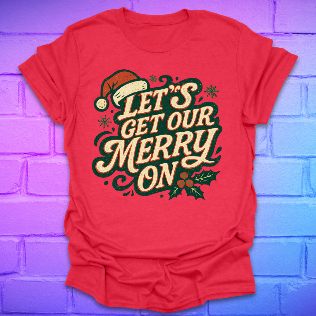 Red t-shirt with Christmas-themed text, 'let's get our merry on' and graphics on a purple brick wall background
