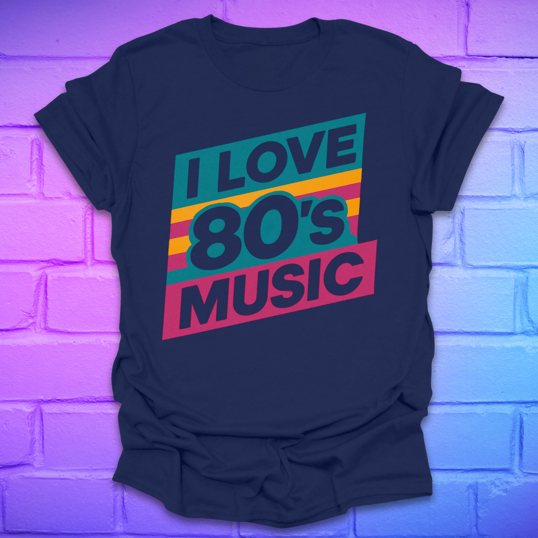 Navy blue t-shirt with 'I Love 80's Music' text on a brick wall background