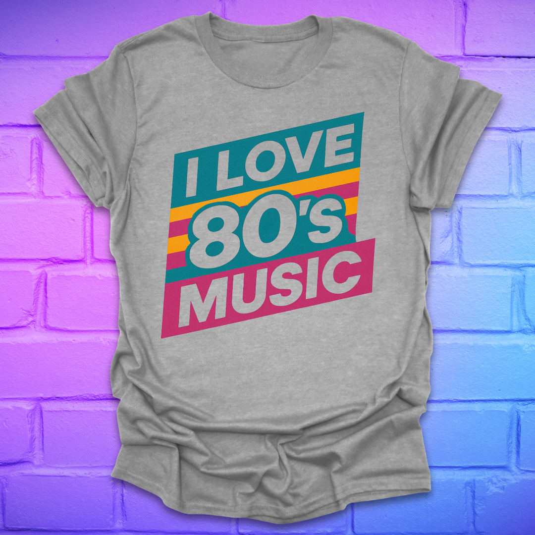 Gray t-shirt with 'I Love 80's Music' text on a brick wall background