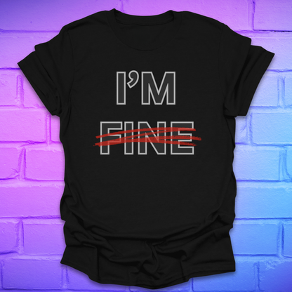 Black t-shirt with 'I'm Fine' text with fine crossed out in red, on a brick wall background