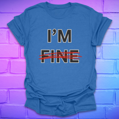 Royal blue t-shirt with 'I'm Fine' text with fine crossed out in red, on a brick wall background