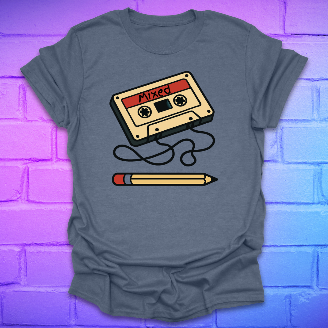 Heather indigo t-shirt with a cassette tape and pencil graphic on a brick wall background