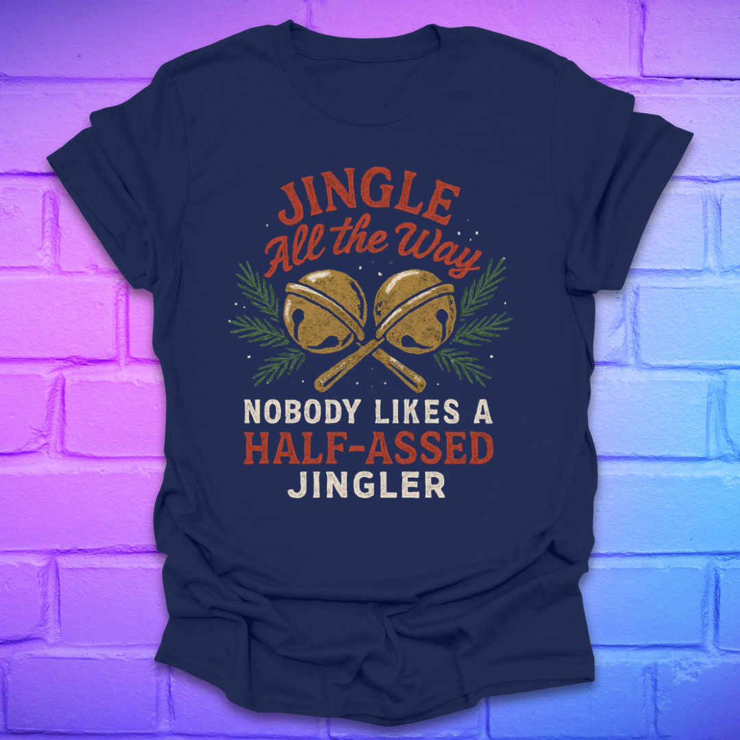 Navy blue t-shirt with humorous text and jingle bells graphic on a brick wall background