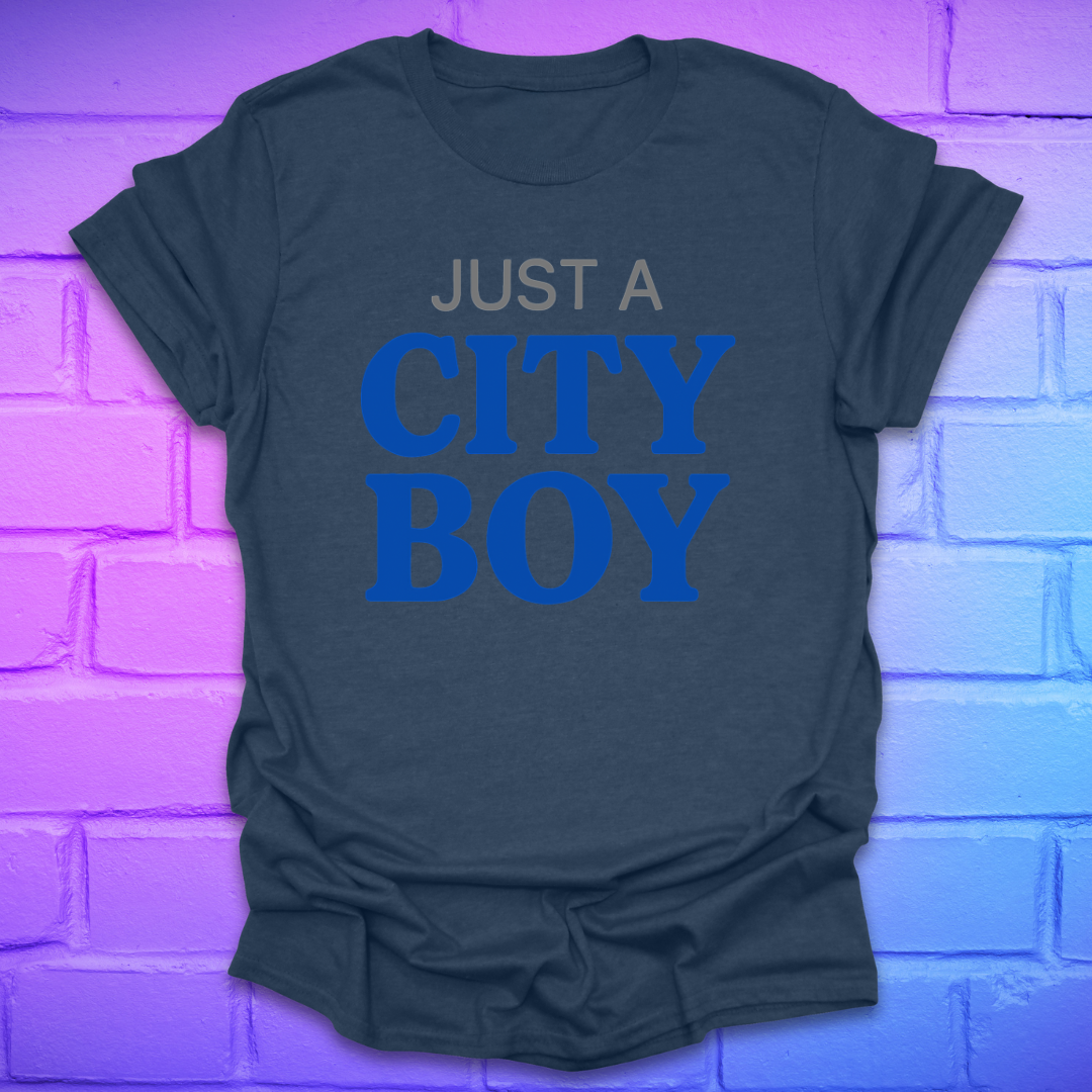 Heather navy t-shirt with 'Just a City Boy' text on a brick wall background