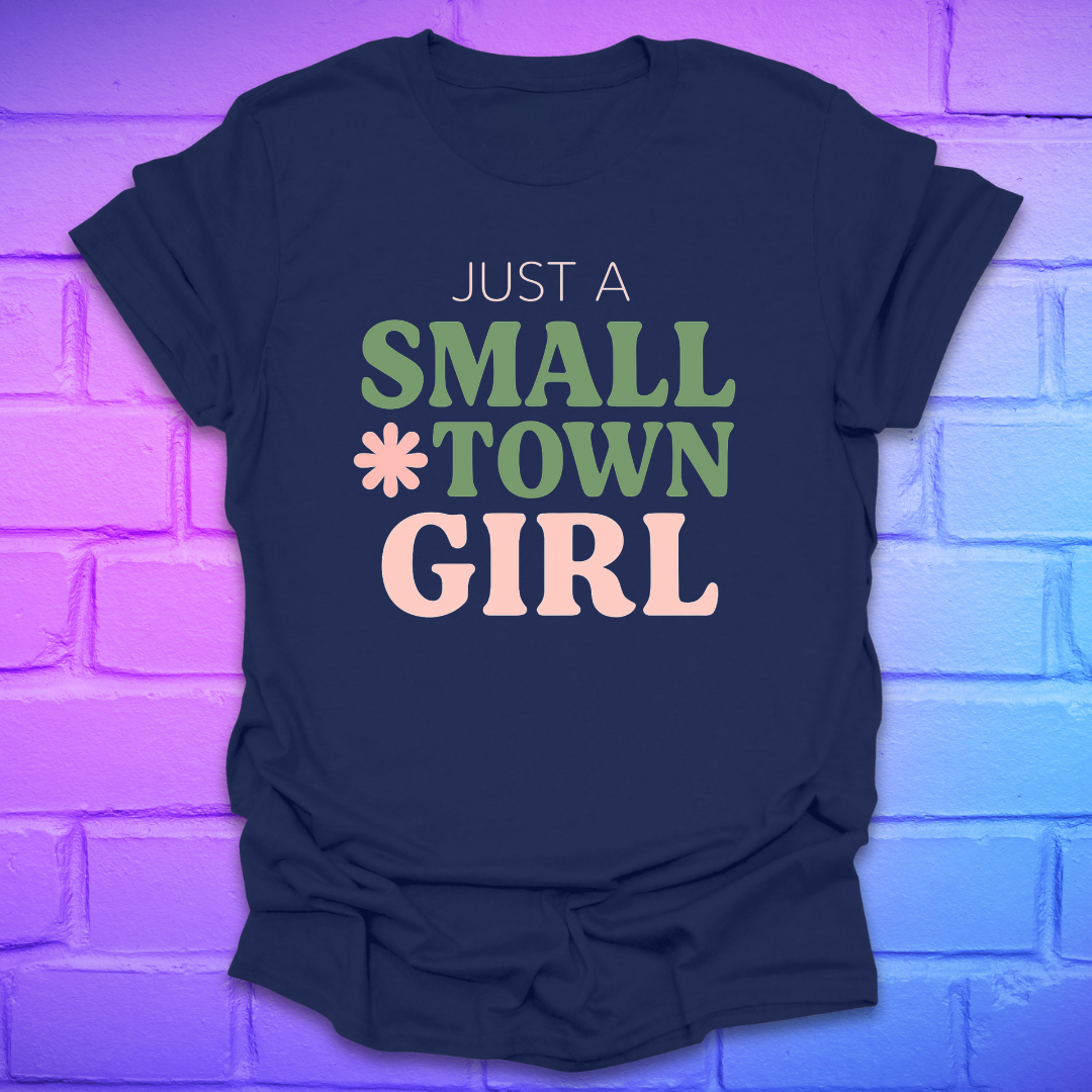 Navy blue t-shirt with 'Just a Small Town Girl' text on a brick wall background