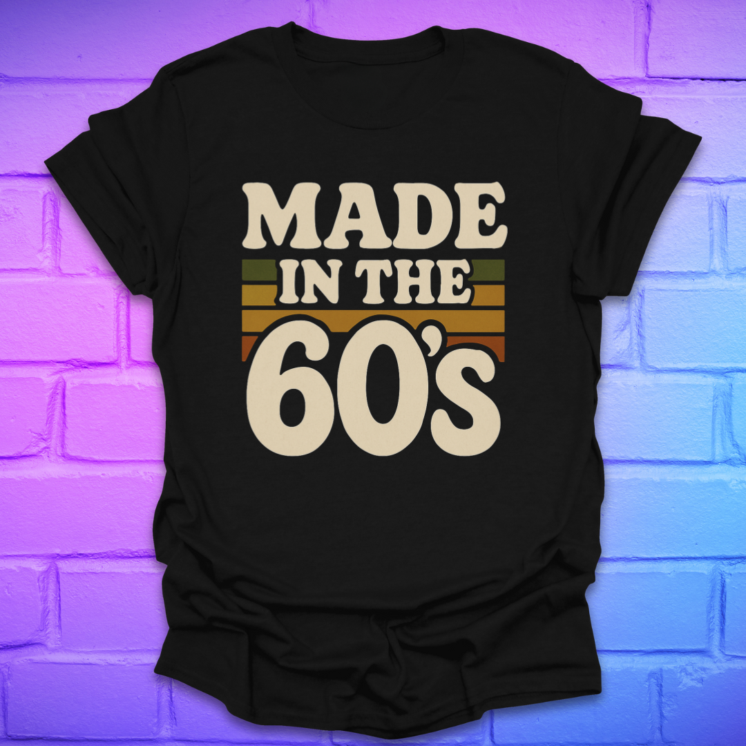 Black t-shirt with 'Made in the 60's' text on a brick wall background