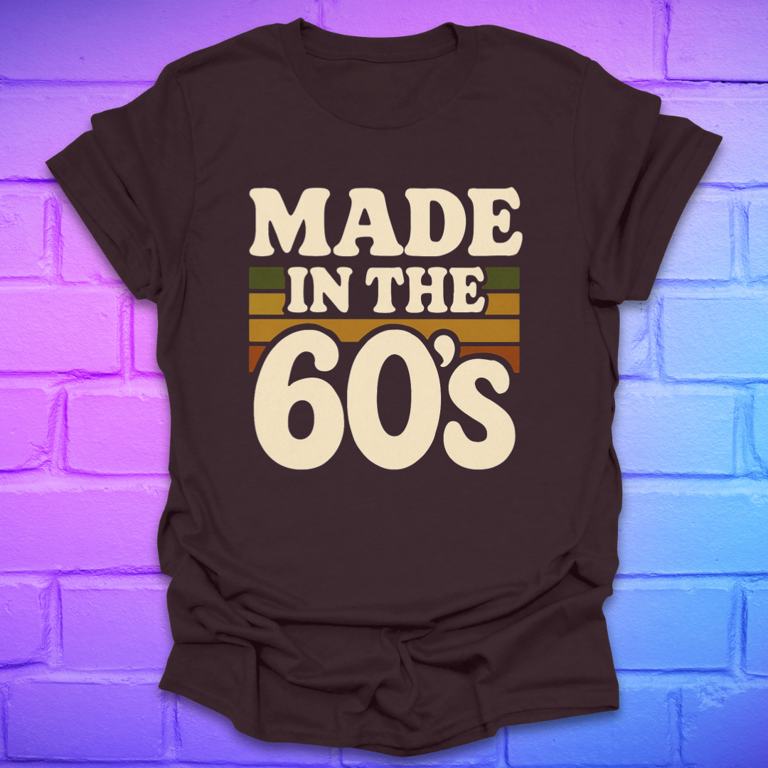 Brown t-shirt with 'Made in the 60's' text on a brick wall background