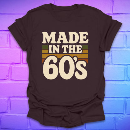Brown t-shirt with 'Made in the 60's' text on a brick wall background