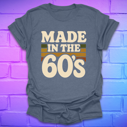 Heather indigo colored t-shirt with 'Made in the 60's' text on a brick wall background