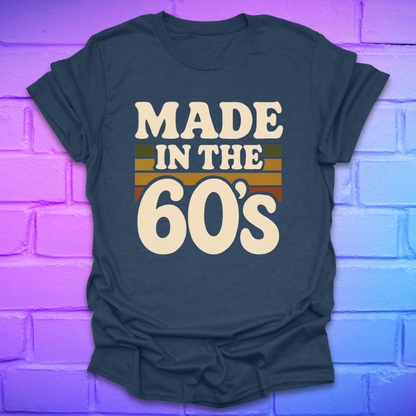 Navy blue t-shirt with 'Made in the 60's' text on a brick wall background
