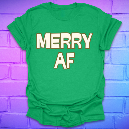 Green t-shirt with 'MERRY AF' text on a purple brick wall background