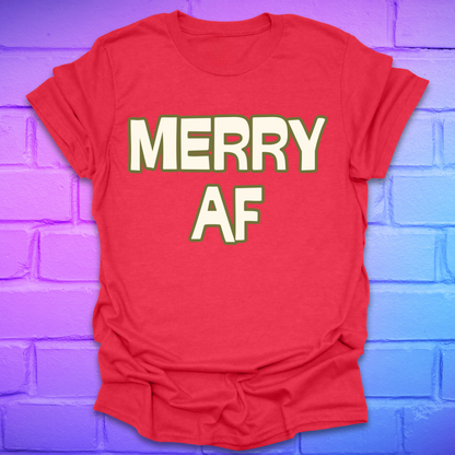 Red t-shirt with 'MERRY AF' text on a brick wall background