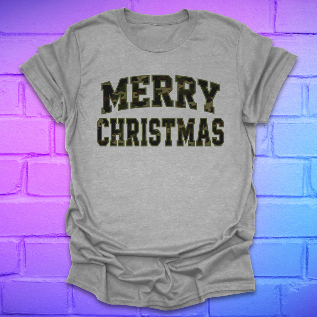 Grey t-shirt with 'Merry Christmas' camo text on a brick wall background