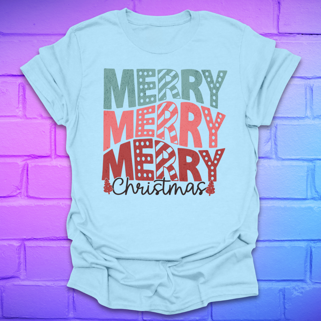 Light blue t-shirt with 'Merry Christmas' text on a purple brick wall background