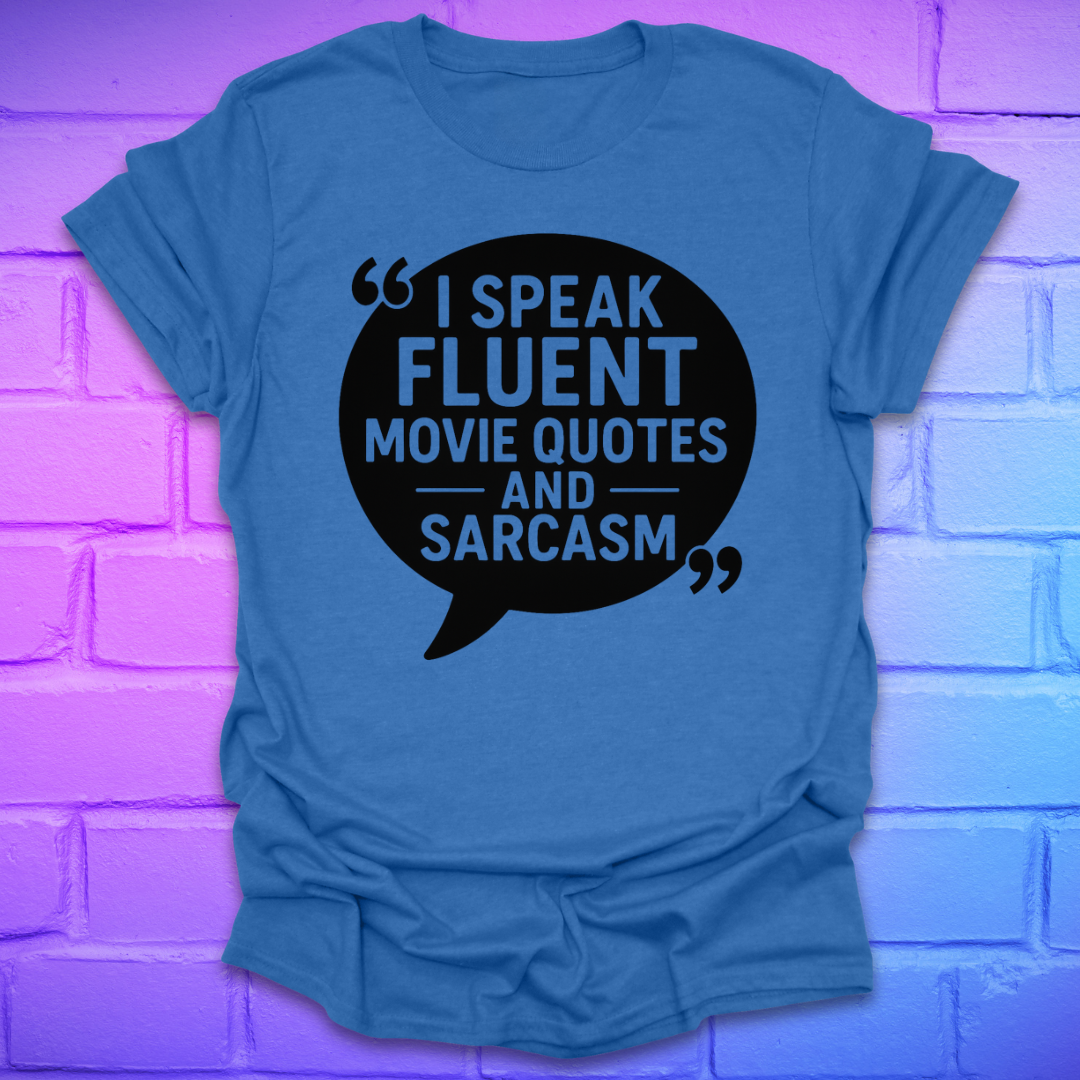 Heather royal t-shirt with a black speech bubble graphic and text on a purple brick wall background