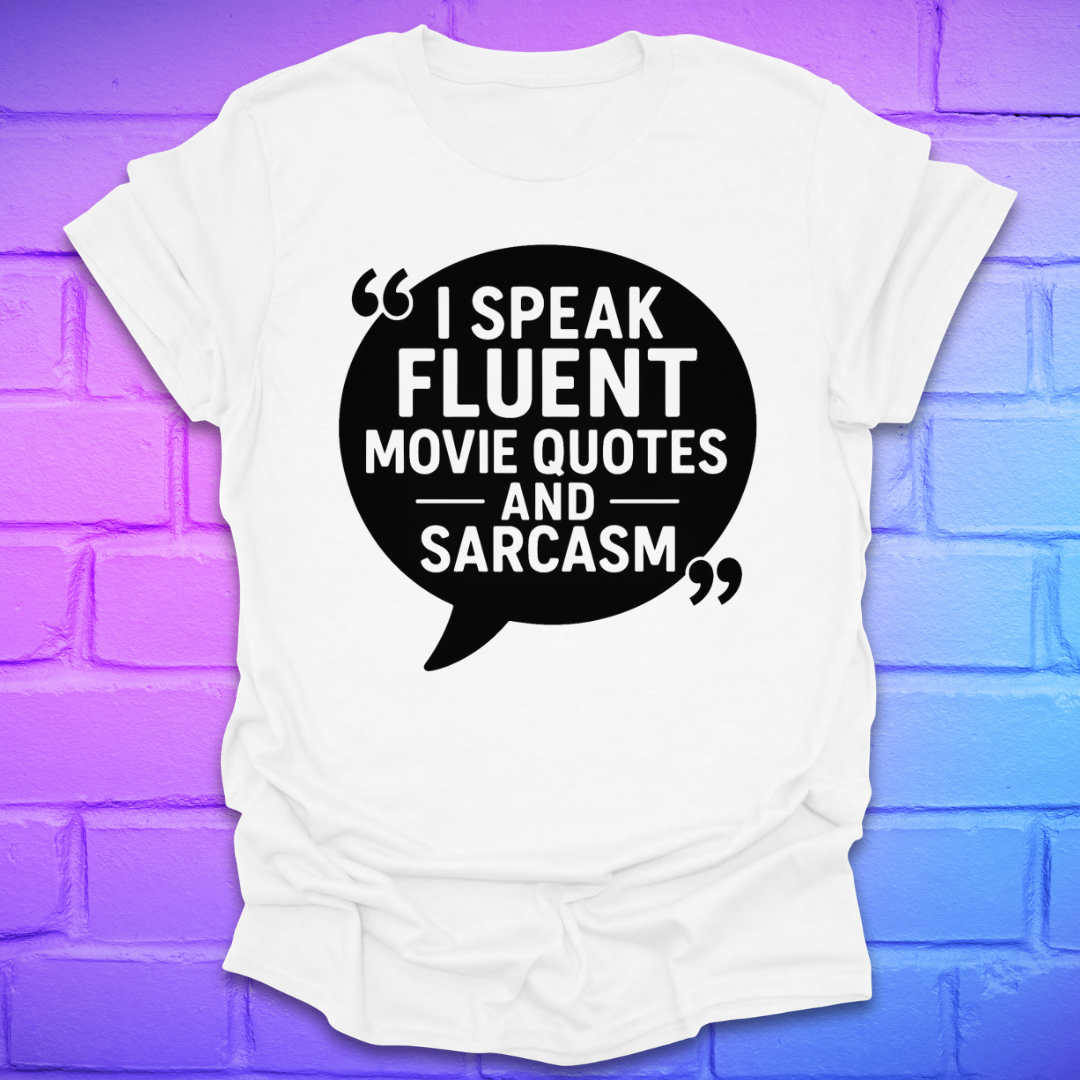 White t-shirt with black speech bubble graphic and text on a blue and purple brick wall background