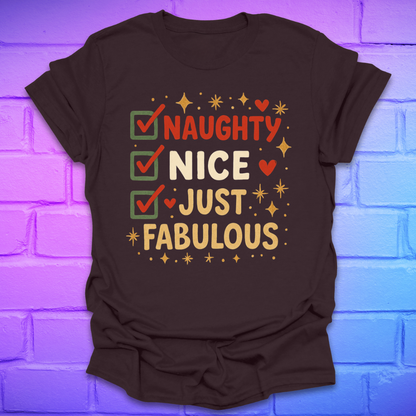 Brown t-shirt with colorful text design, 'naughty nice, just fabulous' on a brick wall background