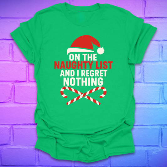 Green t-shirt with Christmas-themed text, 'on the naughty list and i regret nothing' and graphics on a brick wall background