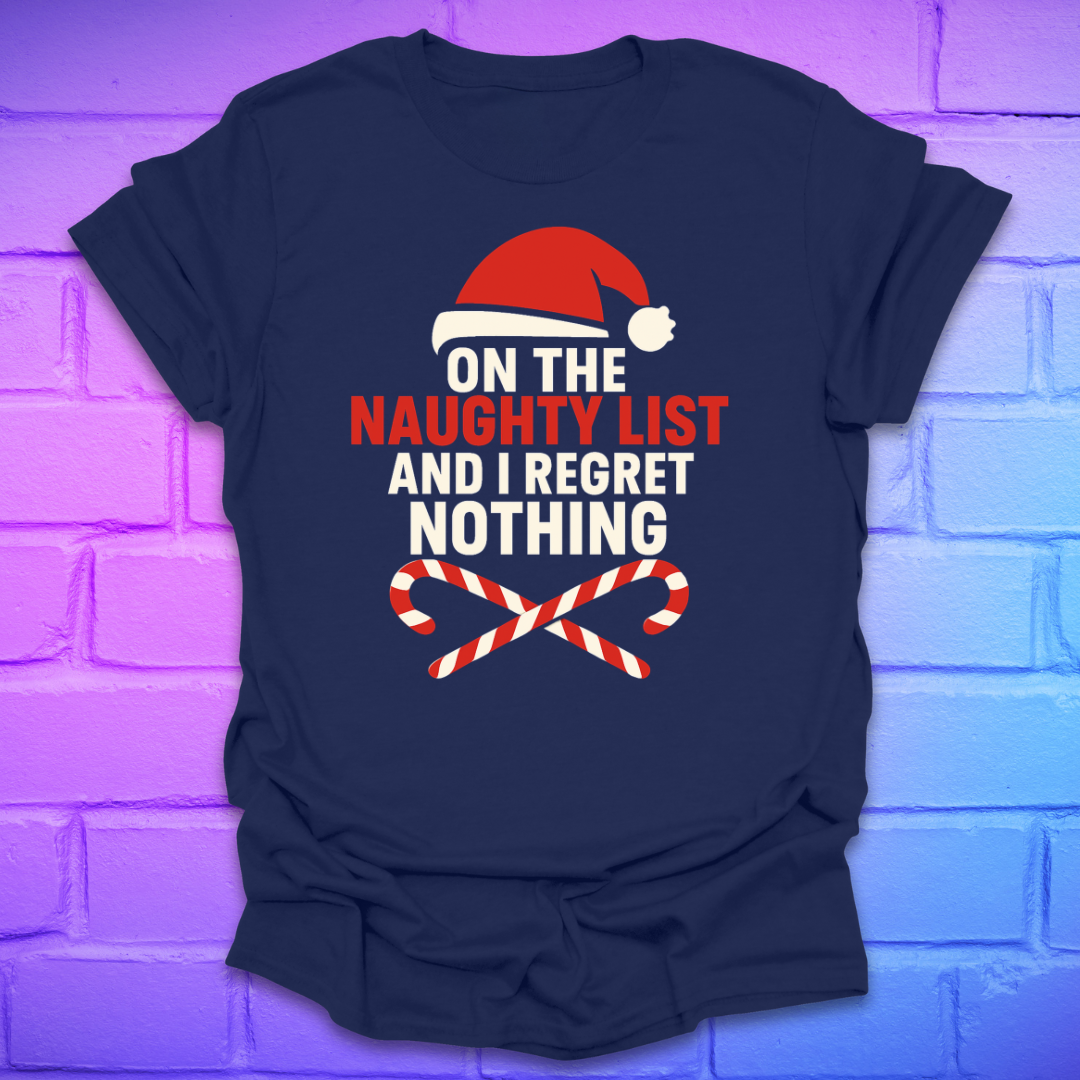 Navy t-shirt with Christmas-themed text, 'on the naughty list and i regret nothing' and graphics on a brick wall background