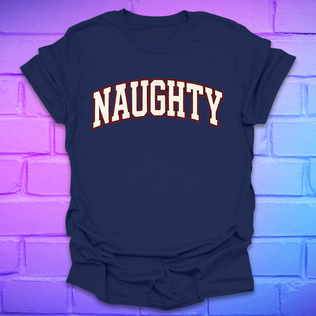 Navy blue t-shirt with 'NAUGHTY' text on a brick wall background