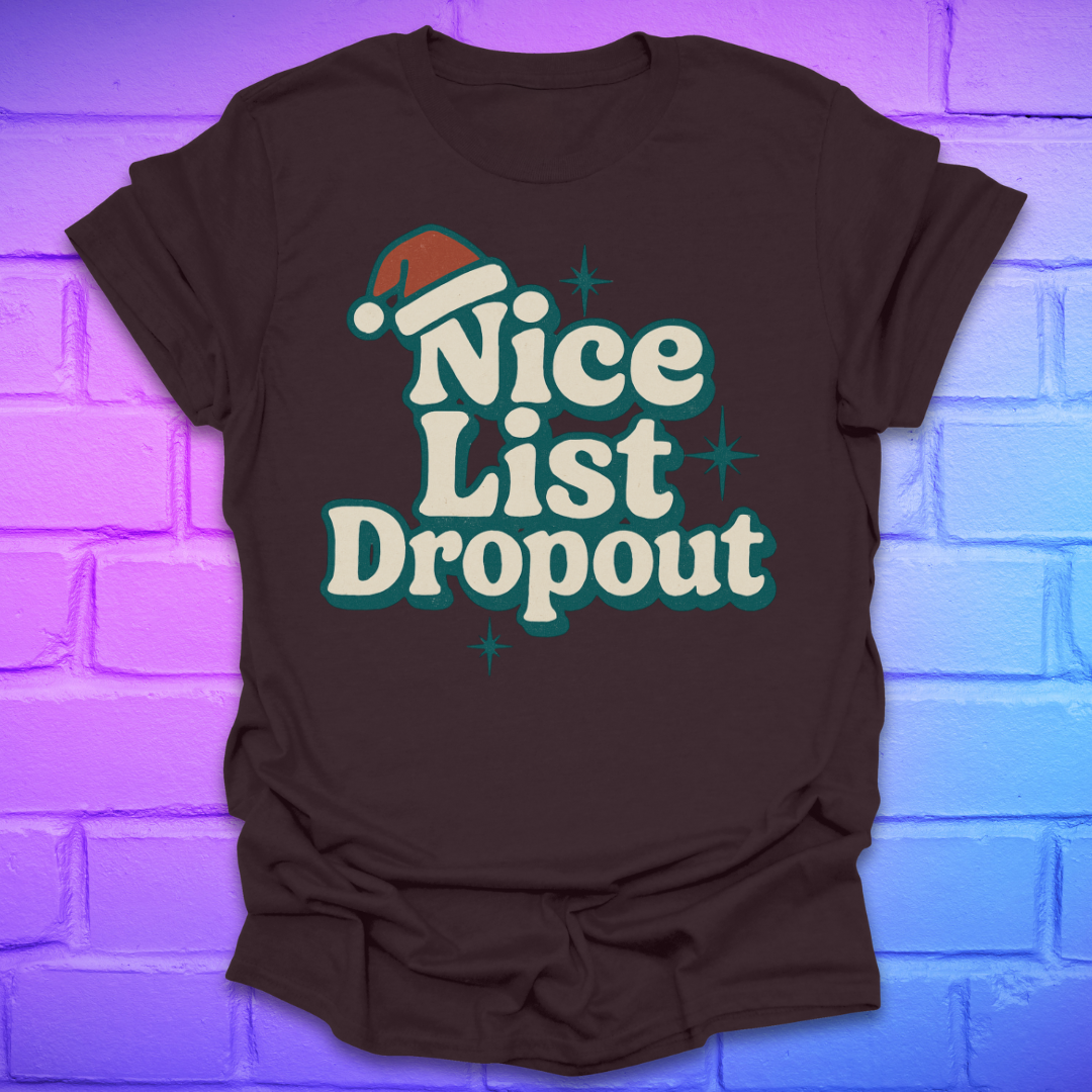Brown t-shirt with 'Nice List Dropout' text and Santa hat graphic on a brick wall background