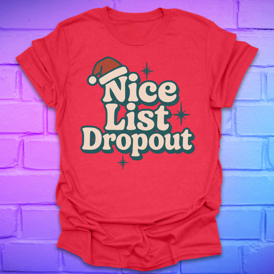 Red t-shirt with 'Nice List Dropout' text and Santa hat graphic on a brick wall background