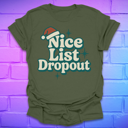 Green t-shirt with 'Nice List Dropout' text and Santa hat graphic on a brick wall background