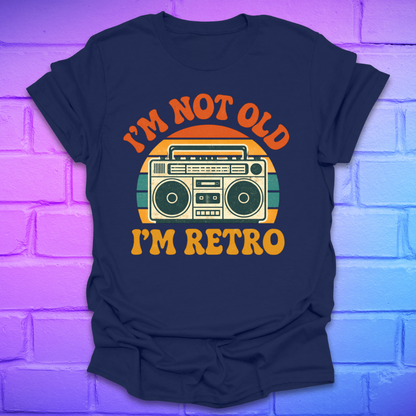 Navy blue t-shirt with a retro boombox graphic and text on a brick wall background