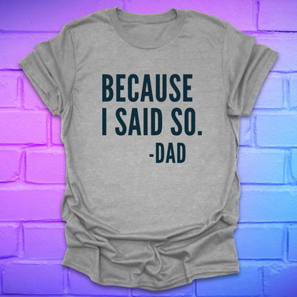 Gray t-shirt with 'BECAUSE I SAID SO. -DAD' text on a brick wall background