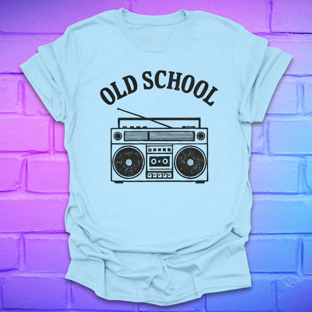 Light blue t-shirt with 'Old School' and boombox graphic on a brick wall background